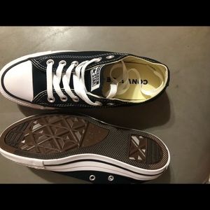 Authentic black and white low top converse